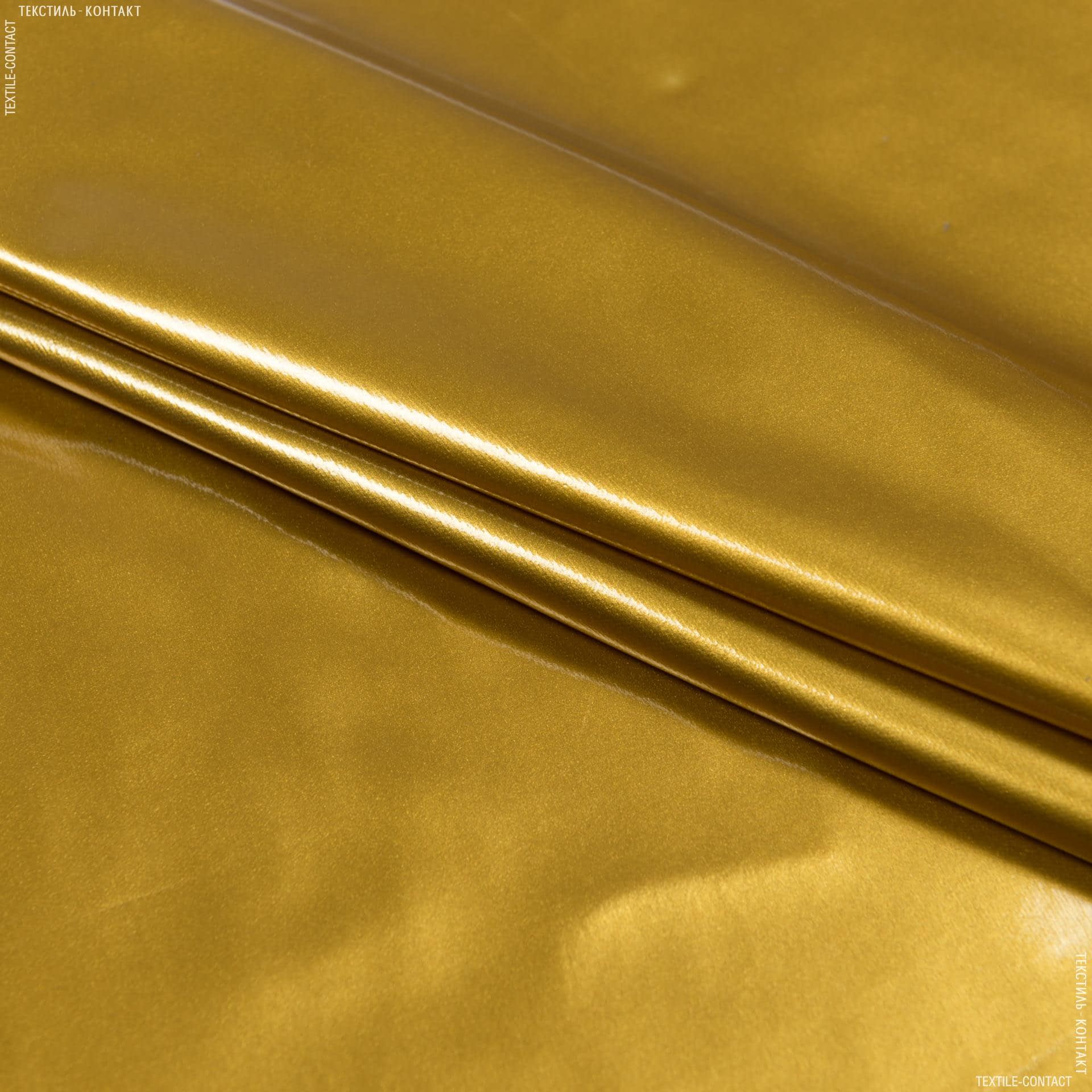 Тканини для верхнього одягу - Штучна шкіра глянець золото