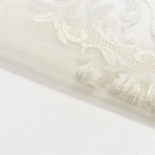 Тканини ненатуральні тканини - Тюль вишивка Анна молочний фестон з блиском з фестоном