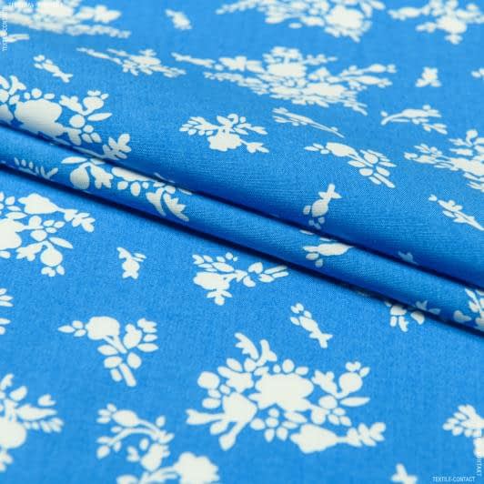 Тканини для суконь - Батист віскозний білі квіти на блакитному